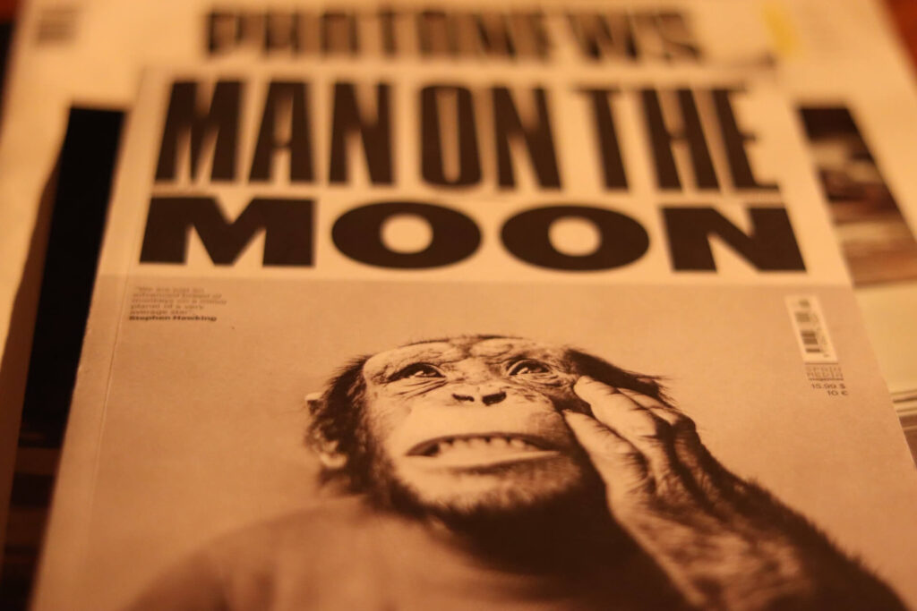 Man of the Moon: a heading on a newspaper